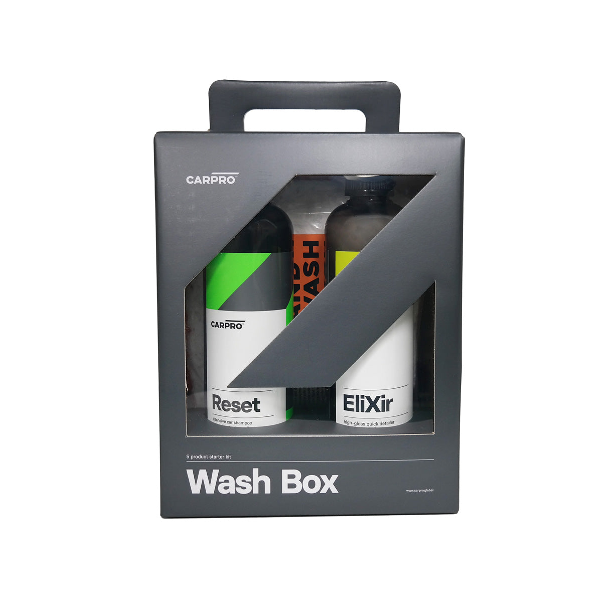 Kit CarPro Wash Box con flaconi di Reset ed Elixir, panni in microfibra, e altri accessori per un lavaggio auto completo e professionale.